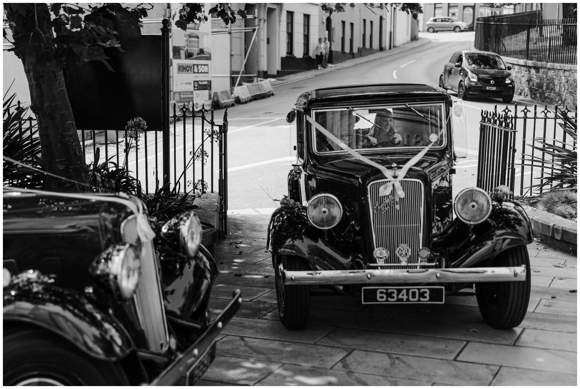 Guernsey bride arriving at the wedding by classic car.